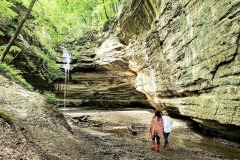 Darley and guide Kathy Casstevens walking through Starved Rock State Park