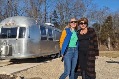 Darley and Jennifer Bias outside of the airstream trailer. 