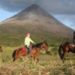 Darley riding horses at Arenal Volcano in Costa Rica