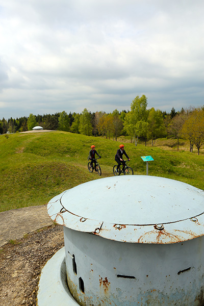 Darley bikes battlefields in Verdun while filming for Travels with Darley