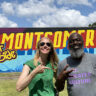 Artist Kevin King with Darley outside his mural on Montgomery's Westside.