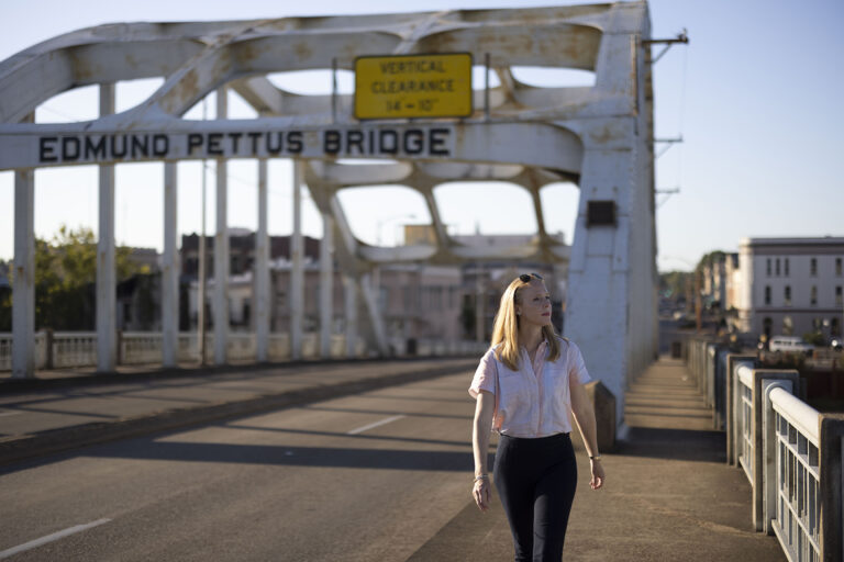 Darley walks over the Edmund Pettus Bridge in Selma