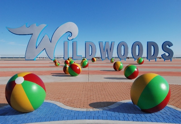 The "Wildwoods" sign in front of the ocean