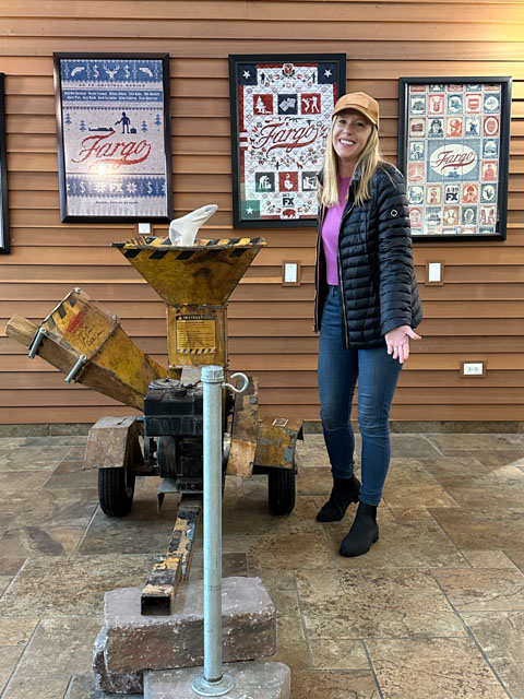 Darley visits The Woodchipper from the movie "Fargo" at the Fargo-Moorhead Visitors Center