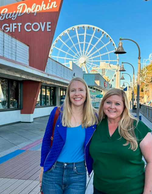 Darley Newman and Michelle Plyler in front of the Gay Dolphin Gift Cove